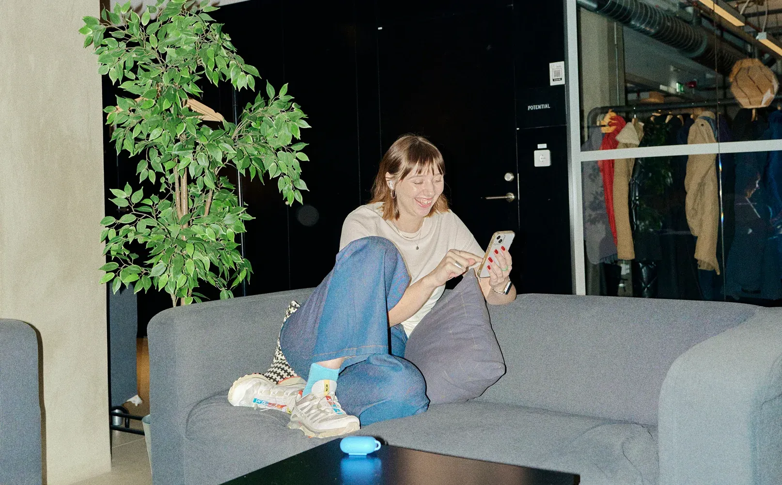 Someone talking to Barnacle on a sofa